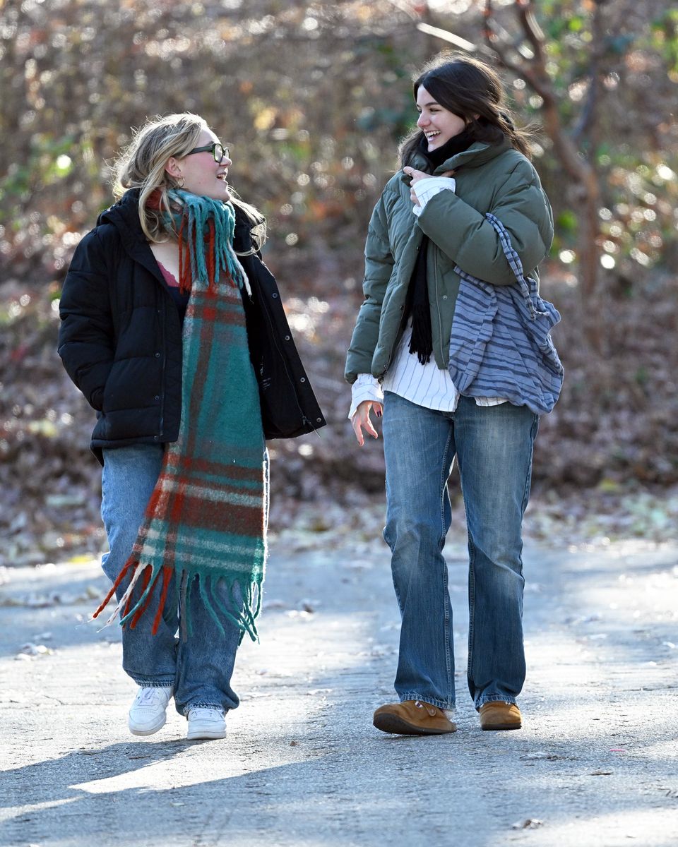 Suri Cruise with a friend on a visit to a Farmers Market in New York. 