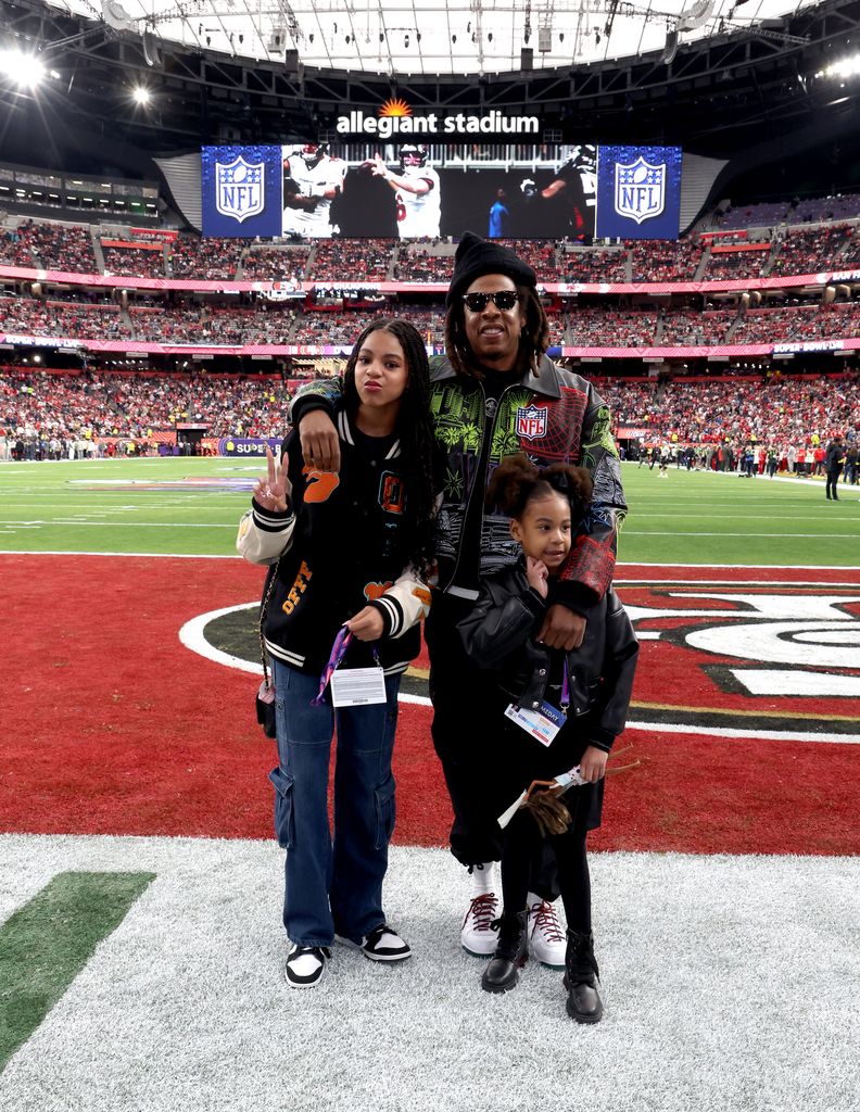 (L-R) Blue Ivy Carter, Jay-Z and Rumi Carter attend the Super Bowl LVIII Pregame at Allegiant Stadium on February 11, 2024 in Las Vegas, Nevada.