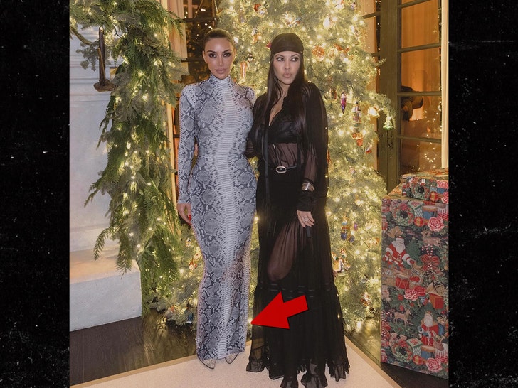 kim kardashian without foot brace and kourtney kardashian