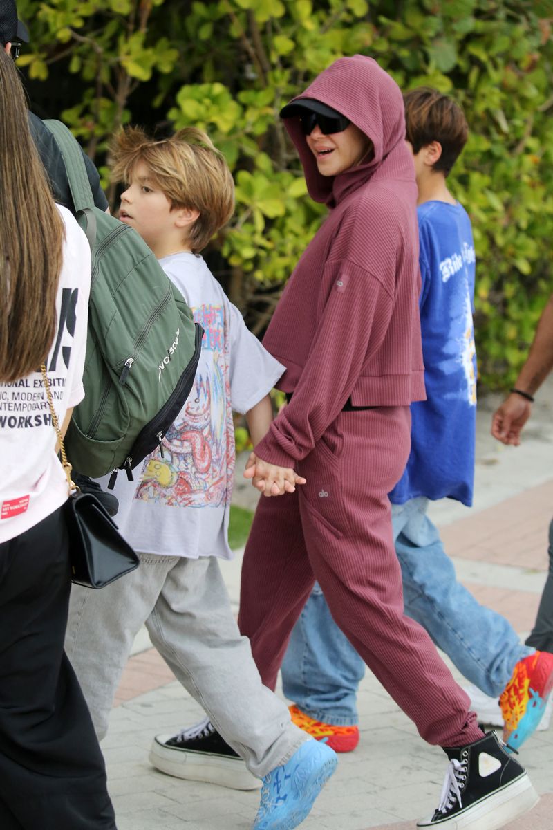 Shakira attempts to go incognito as she hits the beach with her sons on Christmas Day in Miami. 