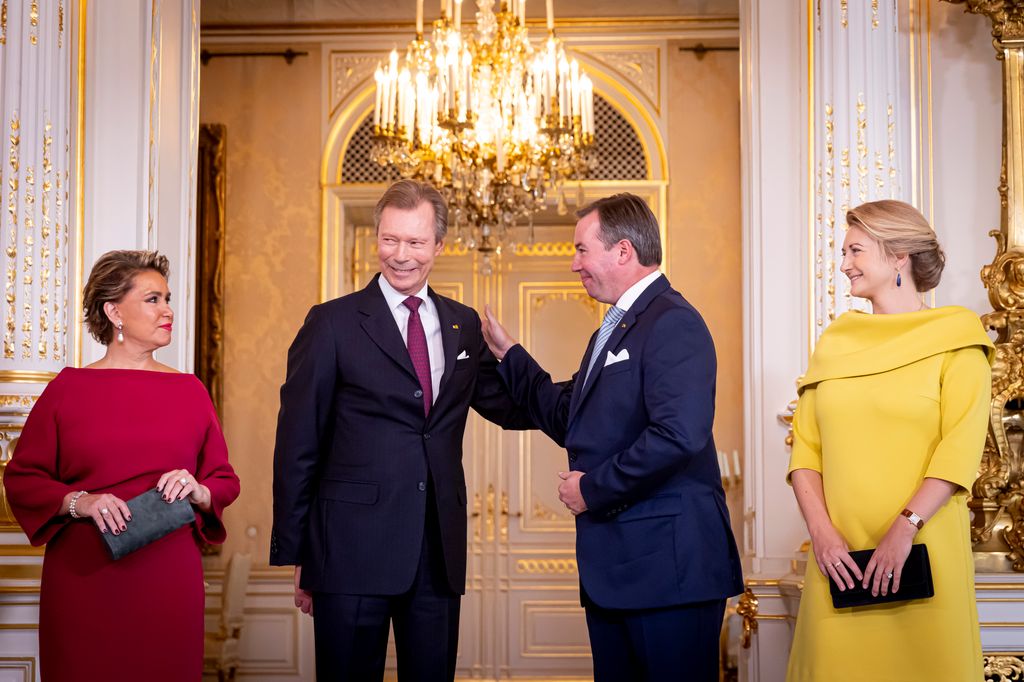 Prince Guillaume and Grand Duke Henri embrace