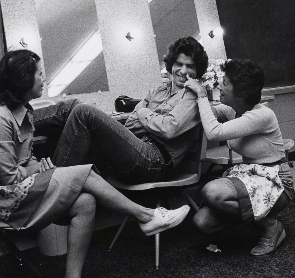 Ellen Tavolta, John Travolta and Ann Travolta in a dressing room in a black and white photo