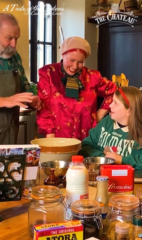 Angel smiling at Dorothy Strawbridge in their kitchen