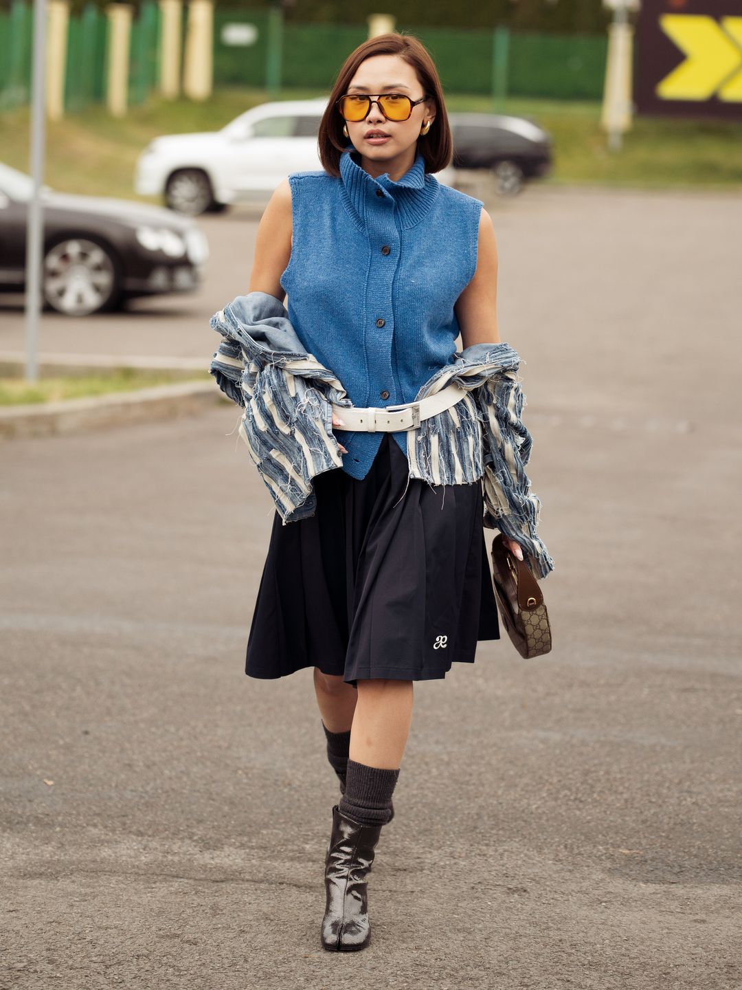 model wearing a modest midi length and a cute knit