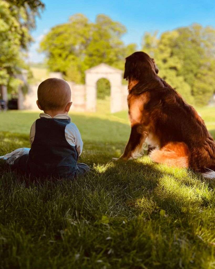 Inigo and his fluffy companion look out over the field