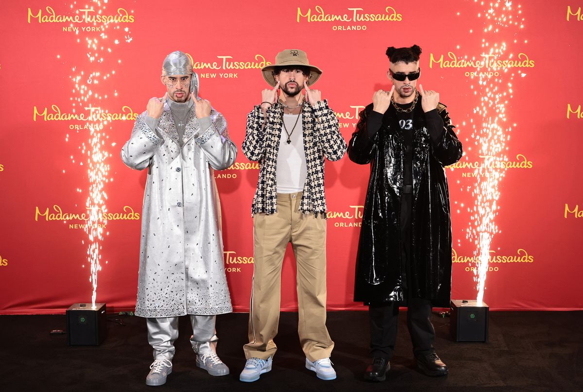 NEW YORK, NEW YORK - APRIL 19: Bad Bunny (C) reveals wax figures for Madame Tussauds New York and Madame Tussauds Orlando at Madame Tussauds on April 19, 2022 in New York City. (Photo by Jamie McCarthy/Getty Images for Madame Tussauds New York) 