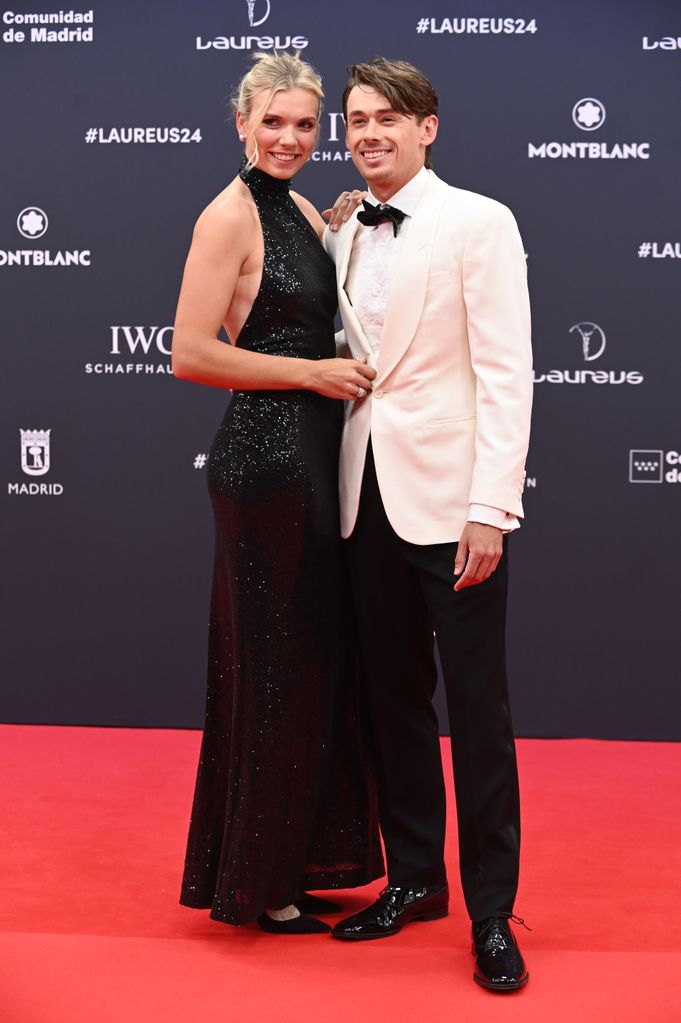 Katie Boulter and Alex de Minaur pose on red carpet