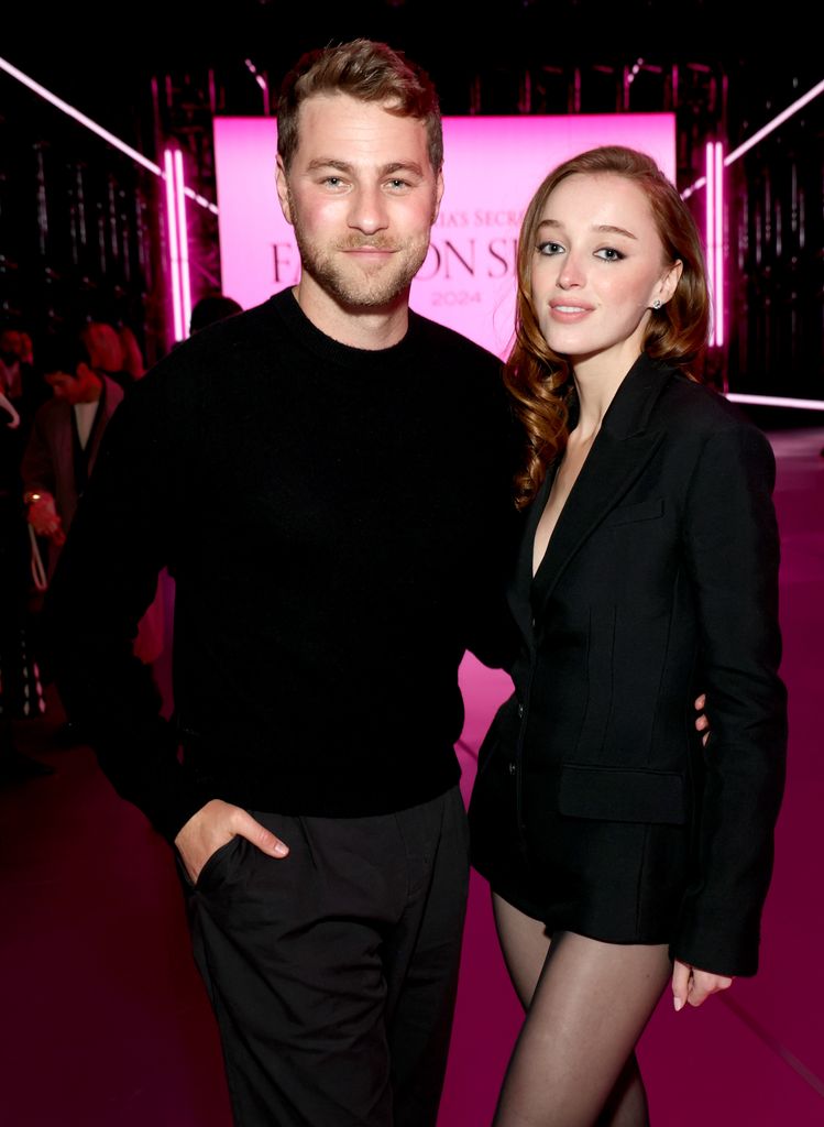 Cameron Fuller and Phoebe Dynevor attend the Victoria's Secret Fashion Show 2024 on October 15, 2024 in New York City. (Photo by Kevin Mazur/Getty Images for Victoria's Secret)