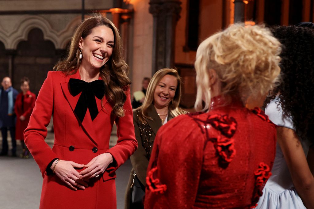 Catherine, Princess of Wales talks with Paloma Faith, Olivia Dean and Gregory Porter during the 'Together At Christmas' Carol Service at Westminster Abbey on December 06, 2024 in London, England#