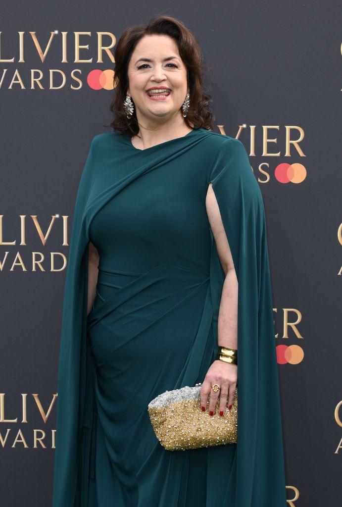 Ruth Jones in a green dress