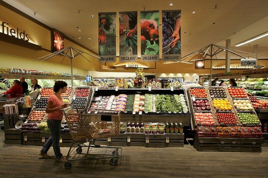 LIVERMORE, CA - JULY 18:  A Safeway customer browses in the fruit and vegetable section at Safeway's new "Lifestyle" store July 18, 2007 in Livermore, California. Safeway unveiled its newest Lifestyle store that features numerous organic and natural foods as well as expanded produce, meat, seafood and floral departments. The store also offers freshly made desserts and baked goods, a coffee roaster, a fresh nut bar and wine section with over 2,000 wines, some of which are stored in a climate controlled wine cellar.  (Photo by Justin Sullivan/Getty Images)