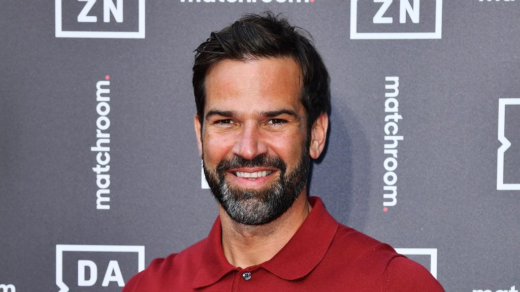 Gethin Jones wearing a red top 