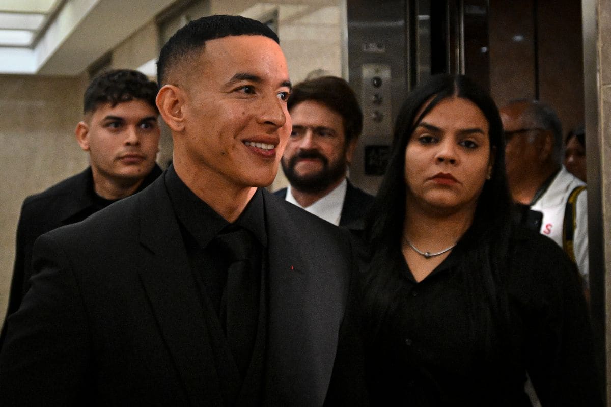 SAN JUAN, PUERTO RICO - DECEMBER 20: Daddy Yankee speaks to the media as he leaves the Puerto Rico Judicial Center following a hearing on December 20, 2024 in San Juan, Puerto Rico. Rapper Daddy Yankee appeared in court after filing a lawsuit against his ex-wife, Mireddys GonzÃ¡lez, claiming that she withdrew $100 million from company accounts without his authorization. (Photo by Miguel J. Rodriguez Carrillo/Getty Images)