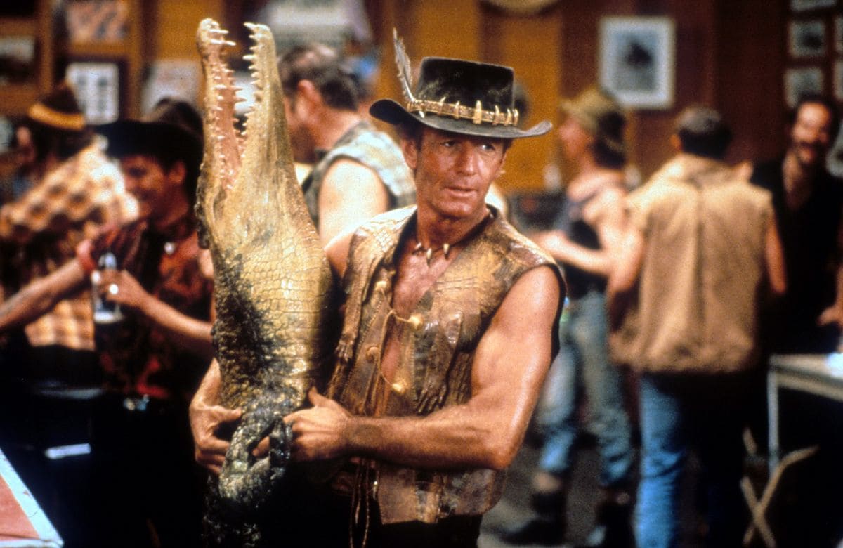 Paul Hogan and a crocodile in 'Crocodile Dundee'