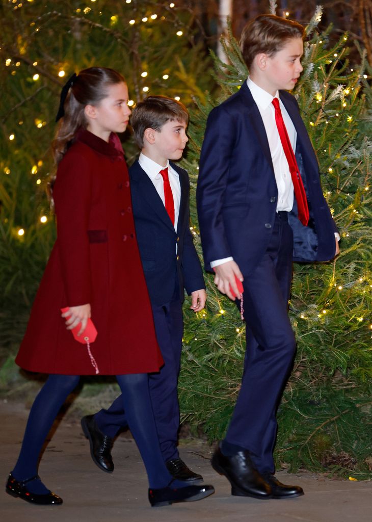 Princess Charlotte of Wales, Prince Louis of Wales and Prince George in red and navy outfits