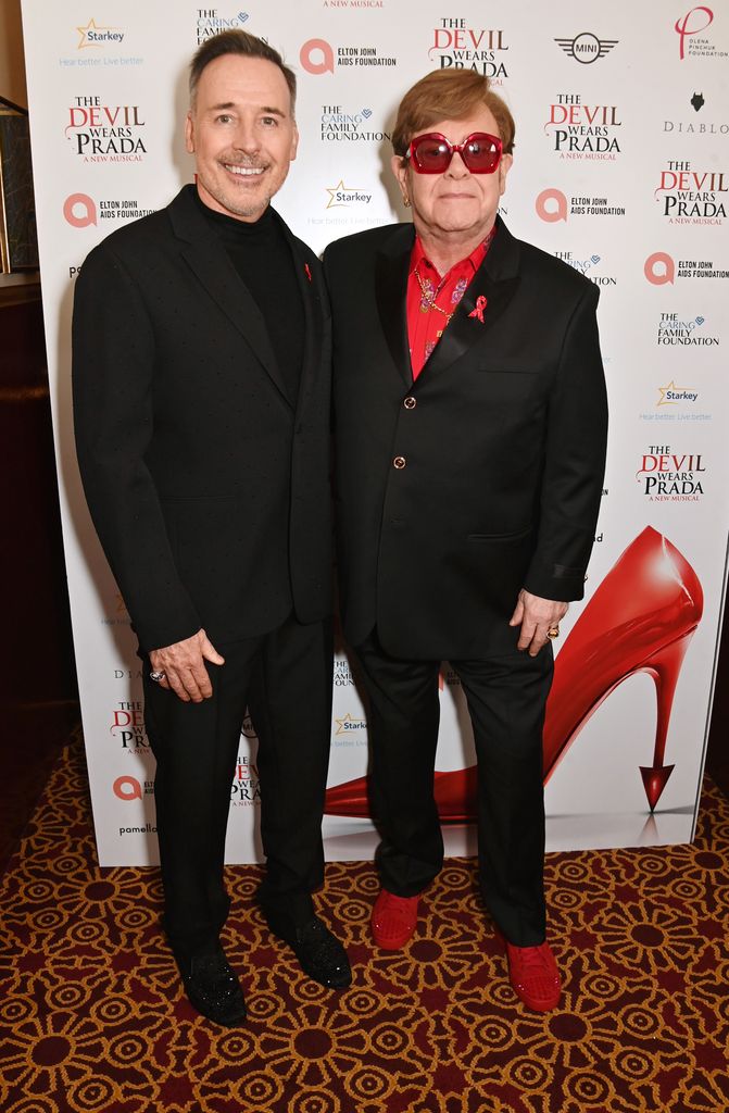 David Furnish and Sir Elton John attend "The Devil Wears Prada Musical" 