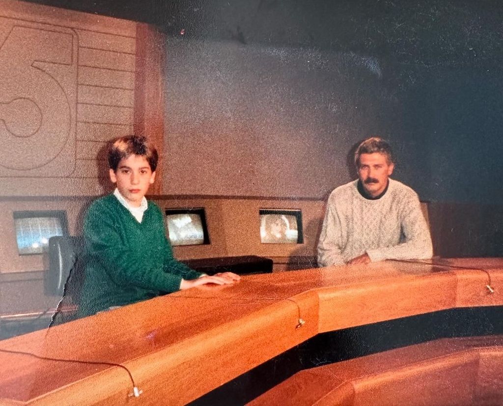 David Muir and his father Ronald Muir sit at a news desk in a throwback photograph shared on Instagram