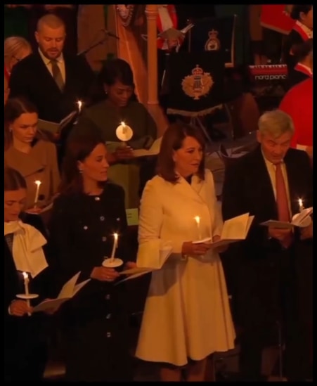 Carole seen watching Kate who was seated directly in front of her at the concert