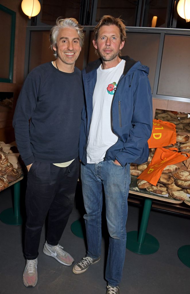 George Lamb and And yCato posing together