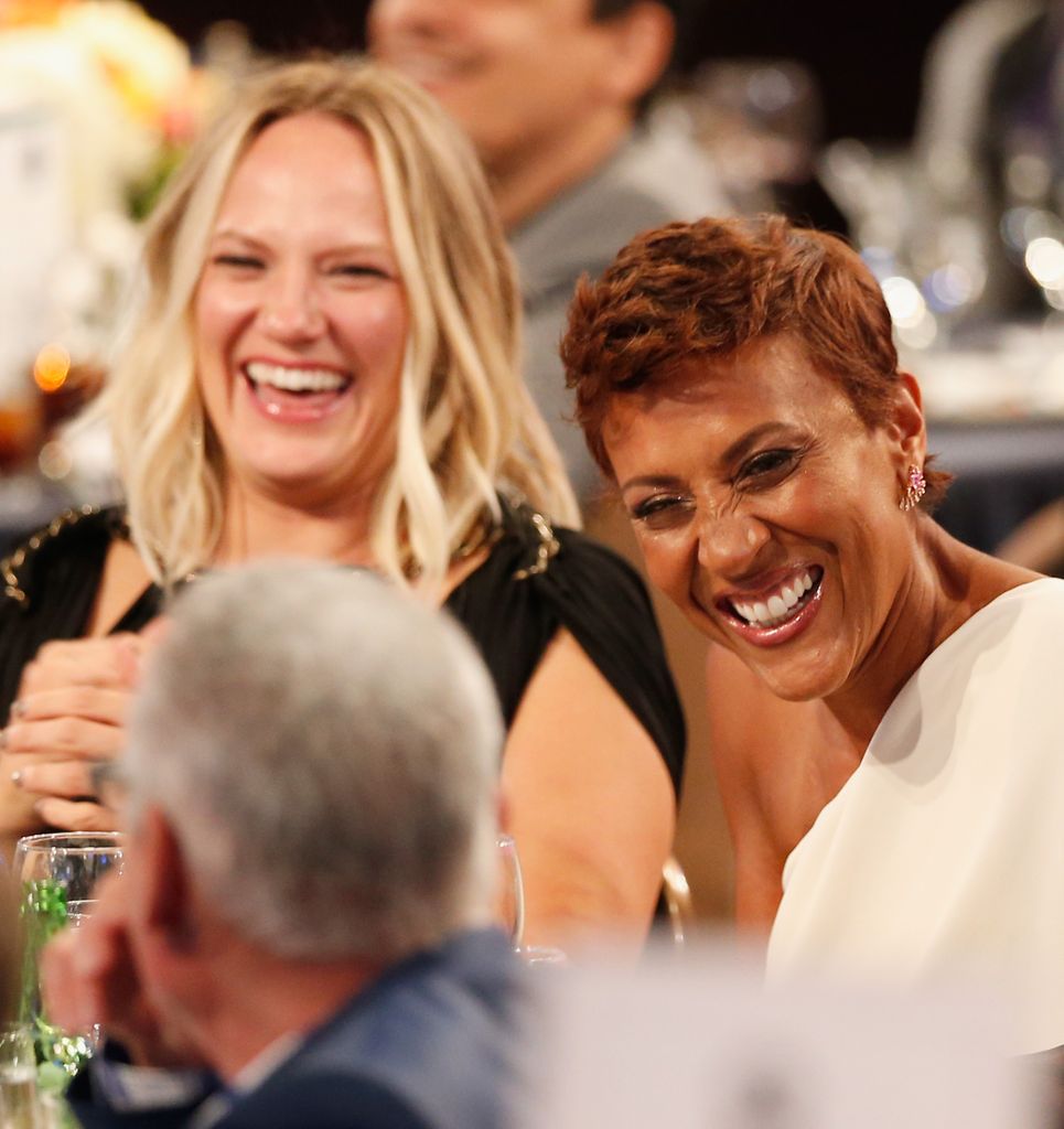 Robin Roberts and Amber Laign smiling dinner