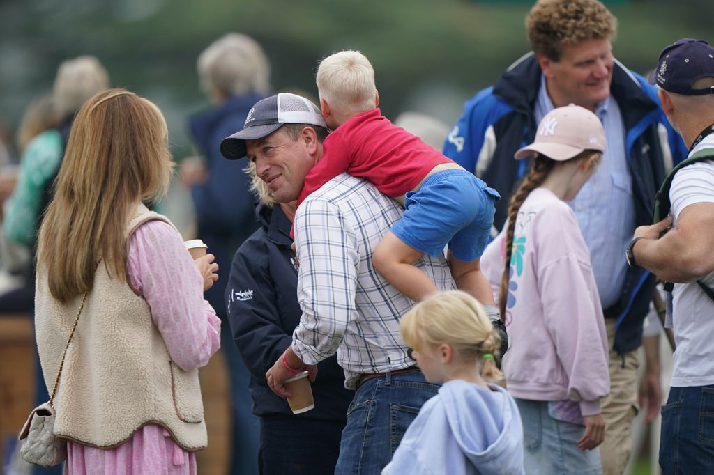 Peter was very pleased to have the little one swinging from his neck