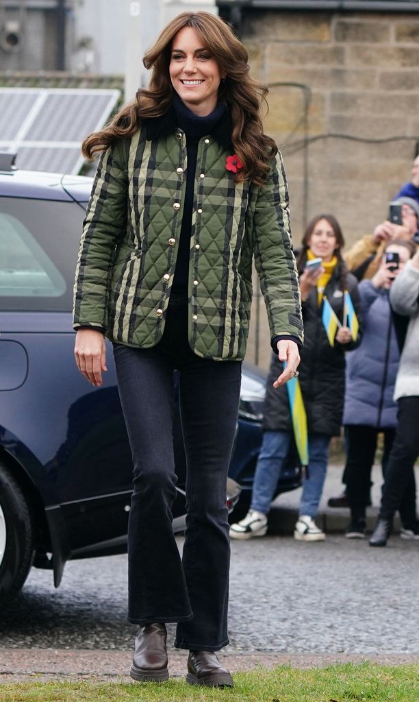 The Princess of Wales in flared jeans and green checked jacket