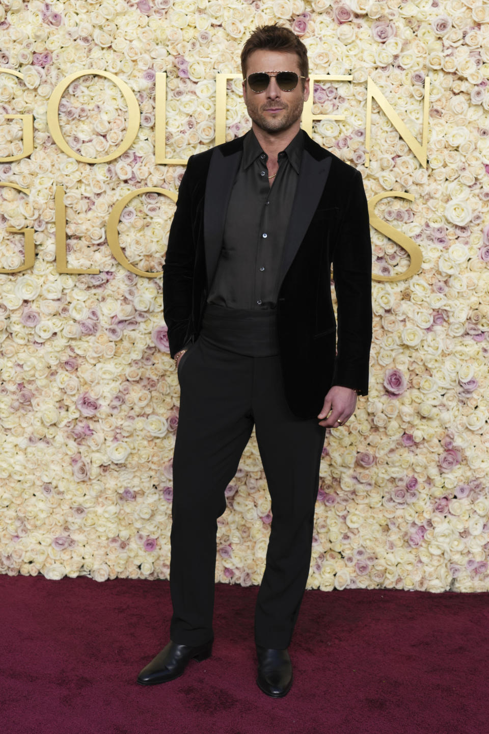 Glen Powell arrives at the 82nd Golden Globes on Sunday, Jan. 5, 2025, at the Beverly Hilton in Beverly Hills, Calif. (Photo by Jordan Strauss/Invision/AP)