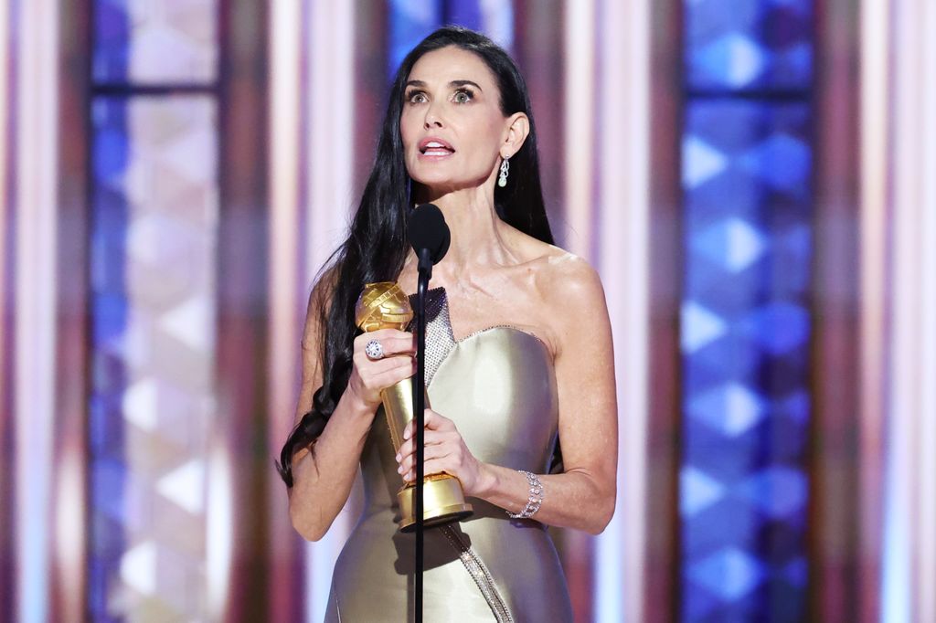 Demi Moore wins Best Performance by a Female Actor in a Motion Picture  Musical or Comedy during the 82nd Annual Golden Globes