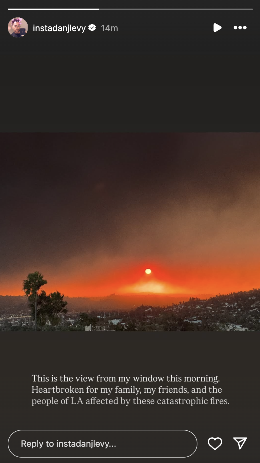 The view at sunrise from Dan Levy's window showing the blaze.