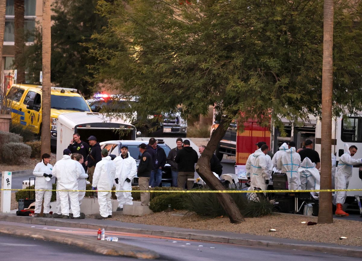 First responders outside the Fashion Show mall across from the Trump International Hotel & Tower Las Vegas as they investigate a Tesla Cybertruck that exploded in front of the hotel's entrance.