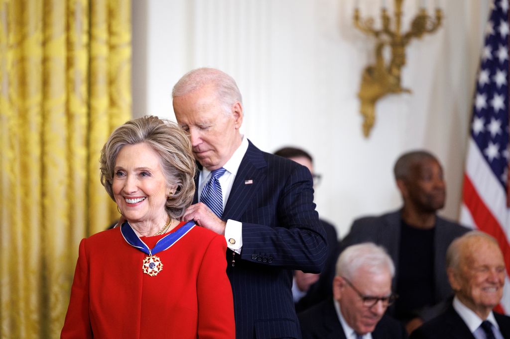 Former U.S. Secretary of State Hillary Clinton is awarded the Presidential Medal of Freedom by U.S. President Joe Biden