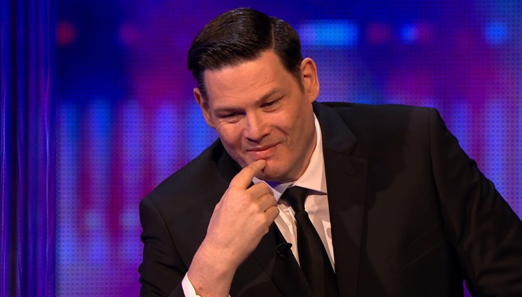 Man in suit in tv studio