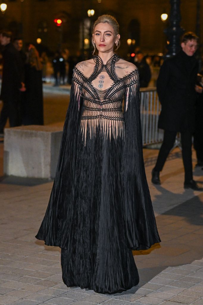 Paris in black dress