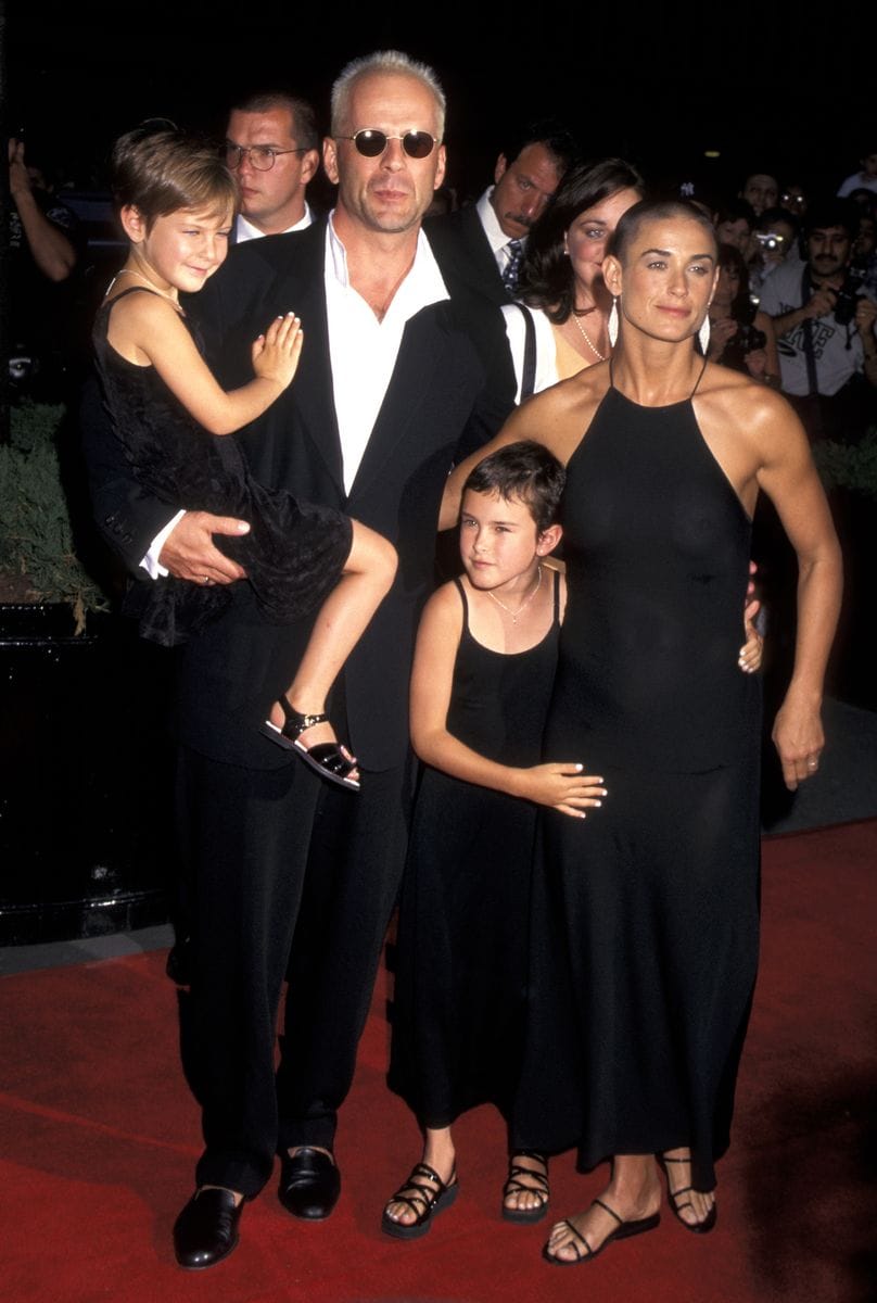Bruce Willis and Demi Moore with their daughters Scout and Rumer at the premiere of 'Striptease'
