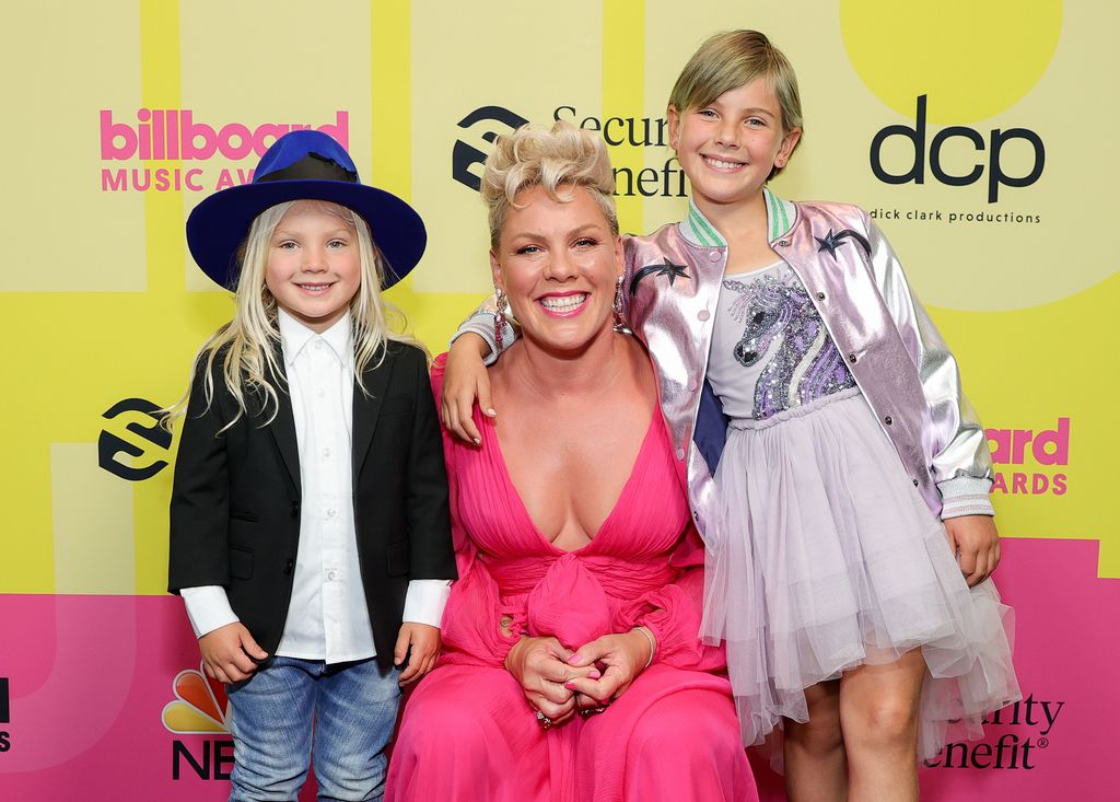 In this image released on May 23, Jameson Moon Hart, P!nk, and Willow Sage Hart pose backstage for the 2021 Billboard Music Awards, broadcast on May 23, 2021 at Microsoft Theater in Los Angeles, California