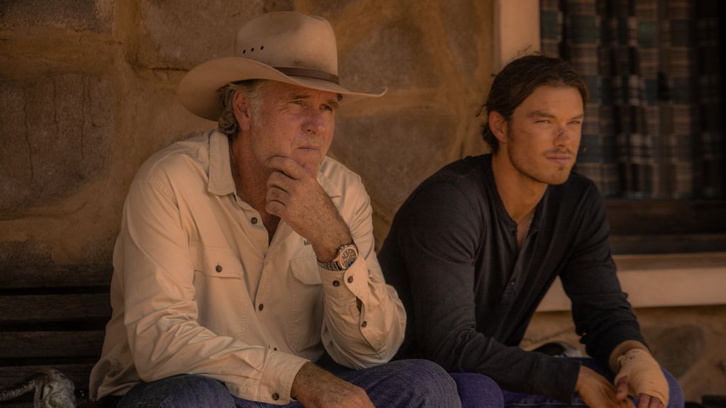 two men in cowboy hats