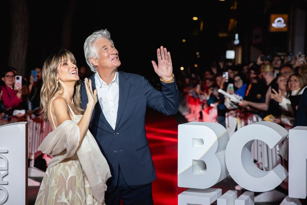 Alejandra Silva and Richard Gere wave to fans