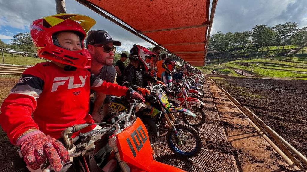 Chris Hemsworth with his son Tristan at a dirt bike event