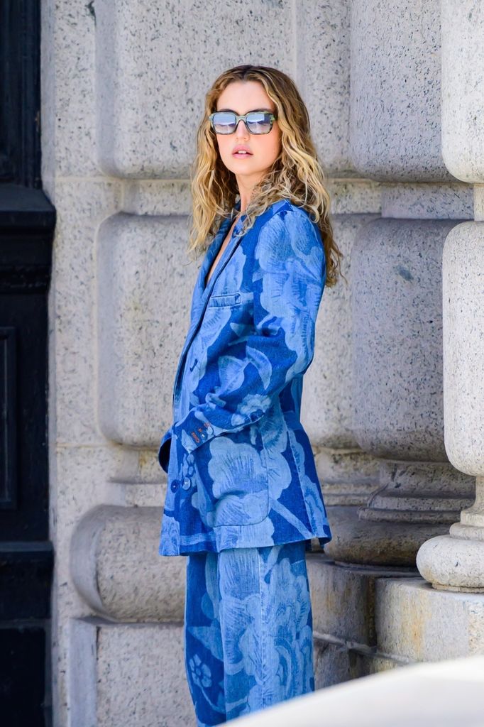 Kai Schreiber blue pantsuit photoshoot