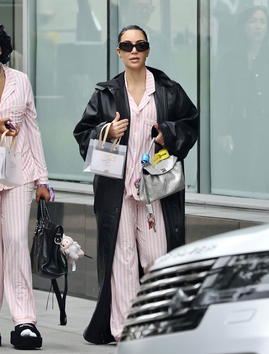 Kim Kardashian leaving Purelux Scalp Spa in Los Angeles after a two-hour treatment with her daughter North West