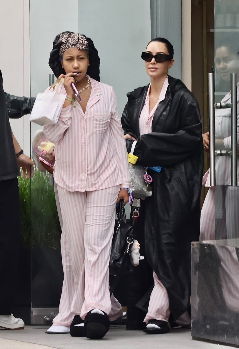 Kim Kardashian leaving Purelux Scalp Spa in Los Angeles after a two-hour treatment with her daughter North West