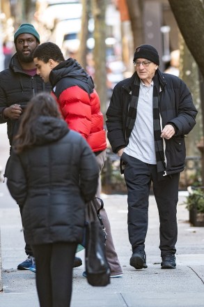 New York, NY  - *EXCLUSIVE*  - Robert De Niro is pictured arriving to visit his Elliot in New York. Elliot is De Niro’s son from his second marriage to actress and philanthropist Grace Hightower. De Niro and Hightower separated in 2018, nearly 20 years after De Niro first filed for divorce from his second wife. Back then, there was also a nasty custody over Elliot and despite everything that was going on, De Niro spent as much time with his youngest son as he could. “He would break off a meeting with me if he had to go see Elliot,” Chuck Low, a friend of De Niro’s and a part-time actor once told People.Pictured: Elliot De Niro, Robert De NiroBACKGRID USA 17 MARCH 2023 USA: +1 310 798 9111 / usasales@backgrid.comUK: +44 208 344 2007 / uksales@backgrid.com*UK Clients - Pictures Containing ChildrenPlease Pixelate Face Prior To Publication*