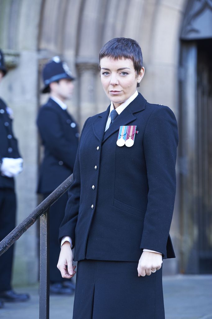 woman in police uniform