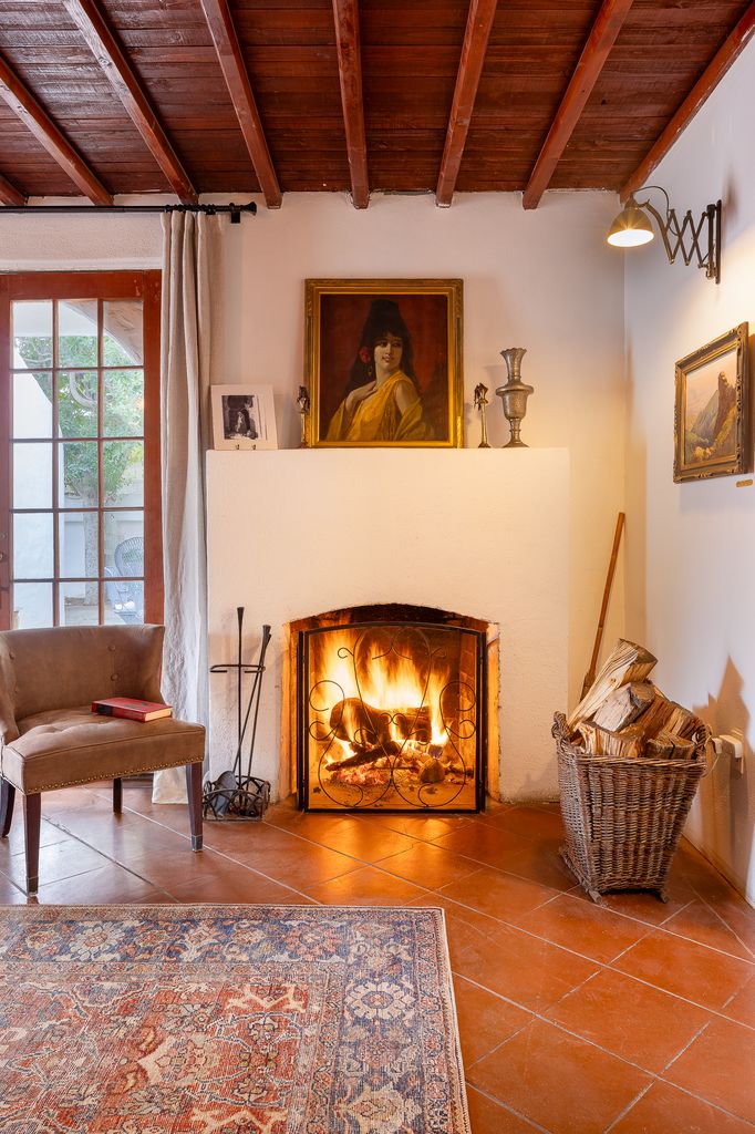 fireplace area at Korakia Pensione room