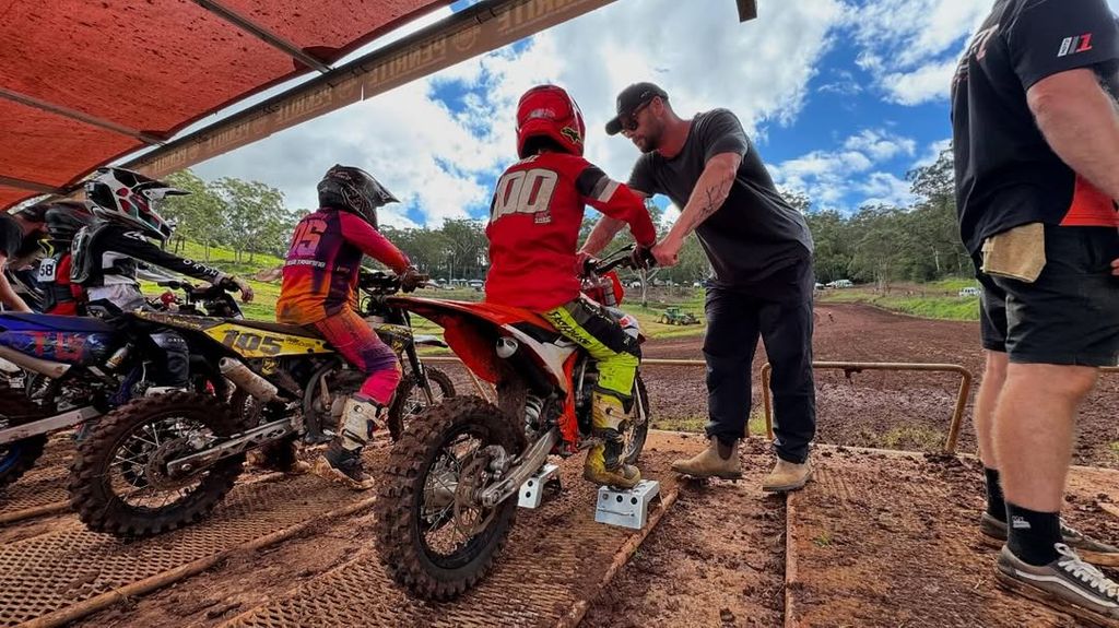 Chris Hemsworth with his son Tristan at a dirt bike race