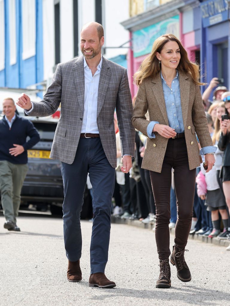 Kate Middleton and Prince William wearing blazers