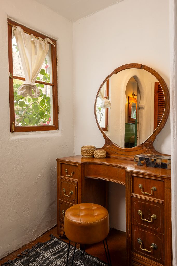 dressing table in the corner of room at Korakia Pensione