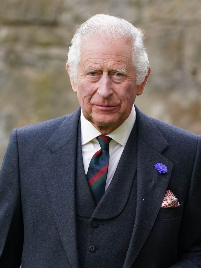 King Charles wearing dark suit