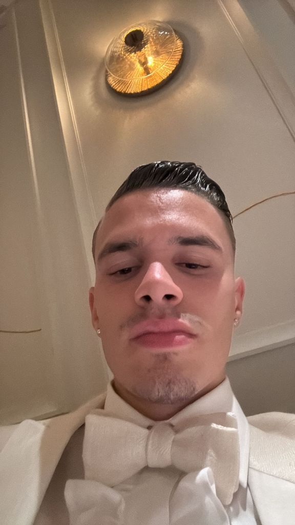 romeo beckham taking selfie in restaurant