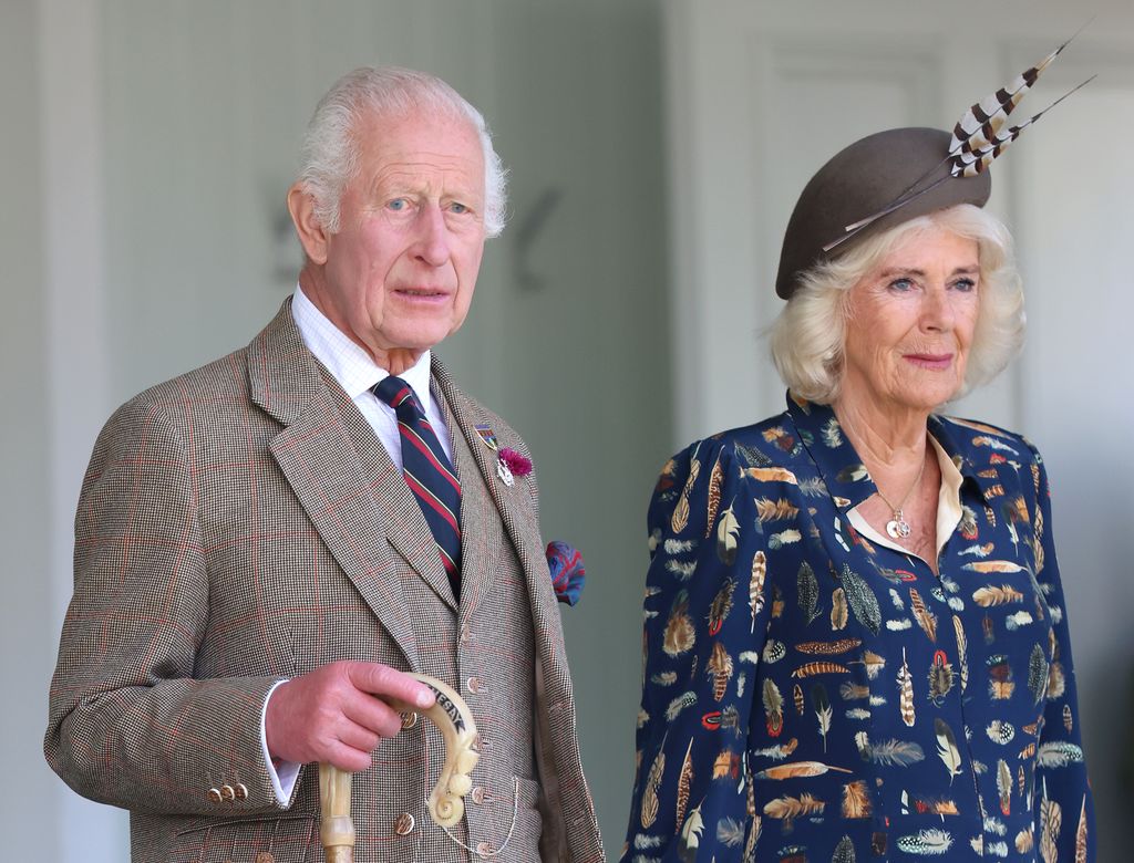 Queen Camilla with King Charles in smart attire